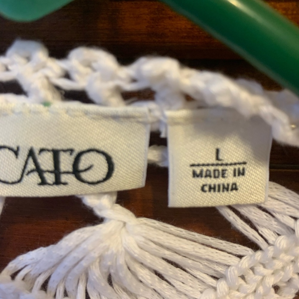 A white crochet top for summer.